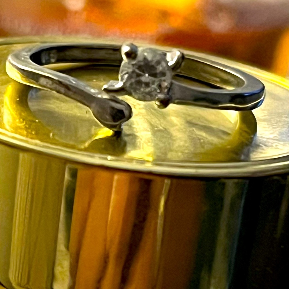 This is a 925 Sterling silver diamond ring size 7